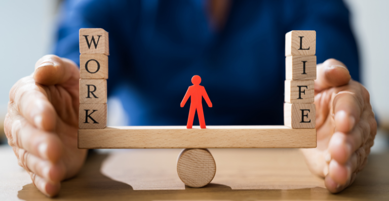 Work and life balance concept with wooden blocks on scale
