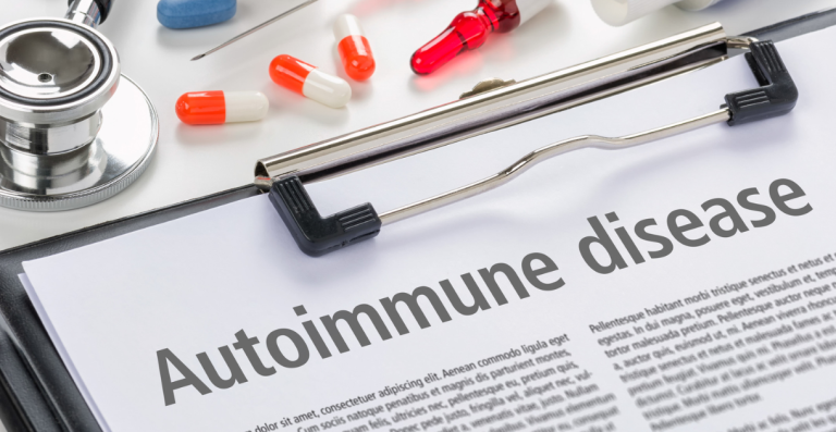 Document labeled autoimmune disease with medical tools and medication