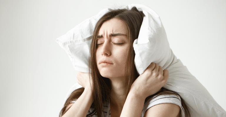 Young woman looking stressed and confused about unexplained weight gain