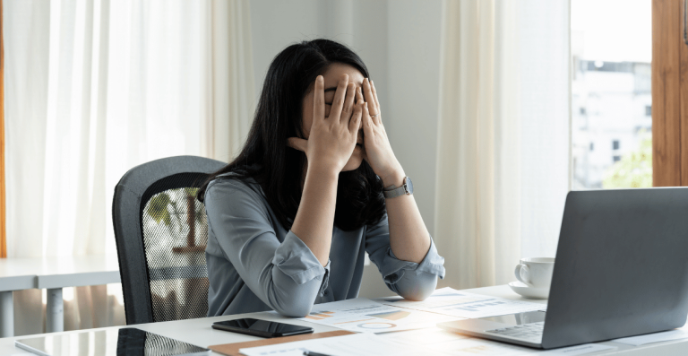 Young woman looking stressed and confused about unexplained weight gain