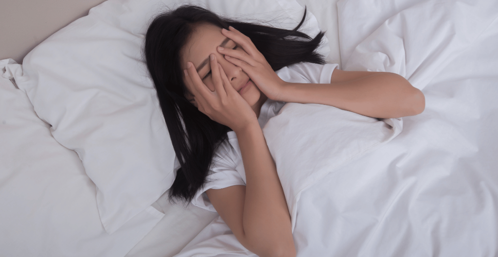 Young woman looking stressed and confused about unexplained weight gain