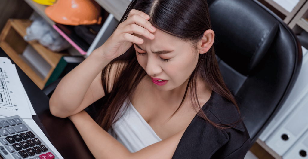 Young woman looking stressed and confused about unexplained weight gain